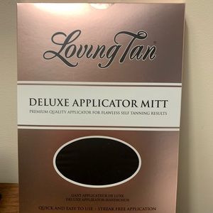 Brand new Loving Tan Deluxe Applicator Mitt. Still sealed in packaging